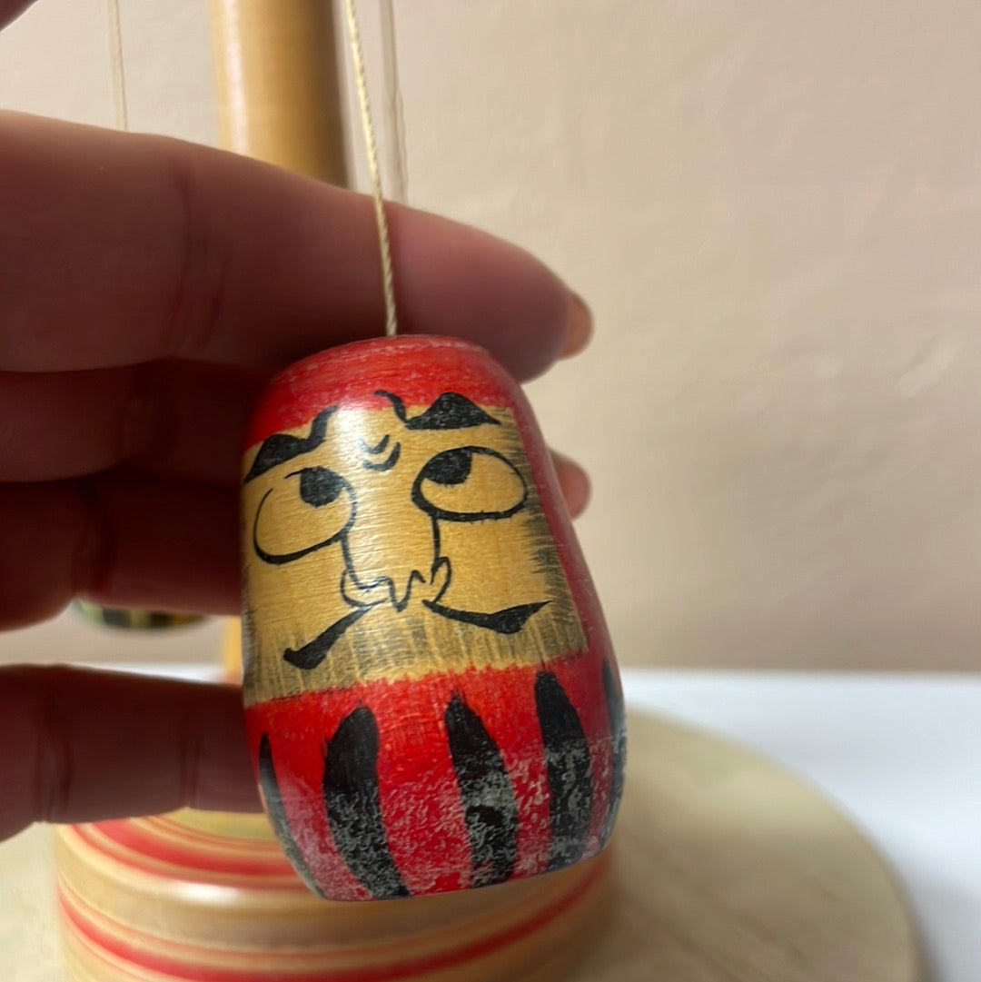 Daruma spinner