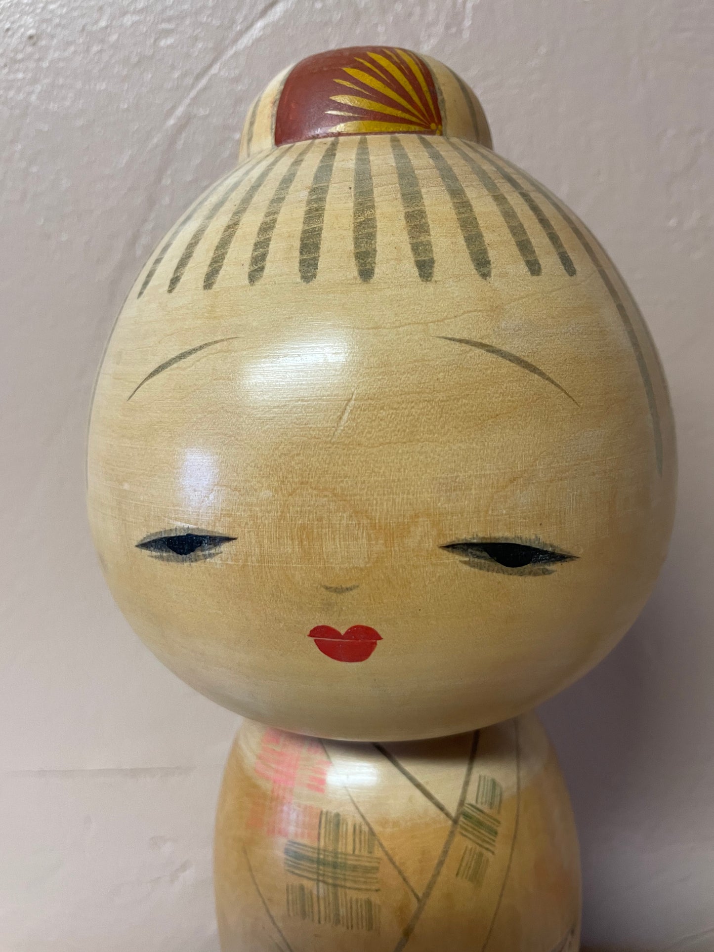 Kokeshi carrying a lantern